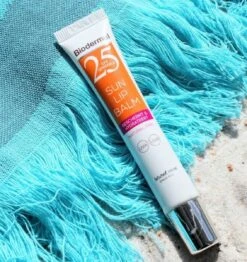 Mode Cosmetica Winkel 39 Biodermal Sun Lipbalm SPF25 - Tube 12 Ml - Natural Pink - Lippenbalsem